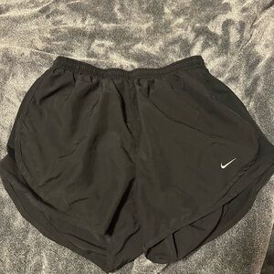 Black Nike running shorts